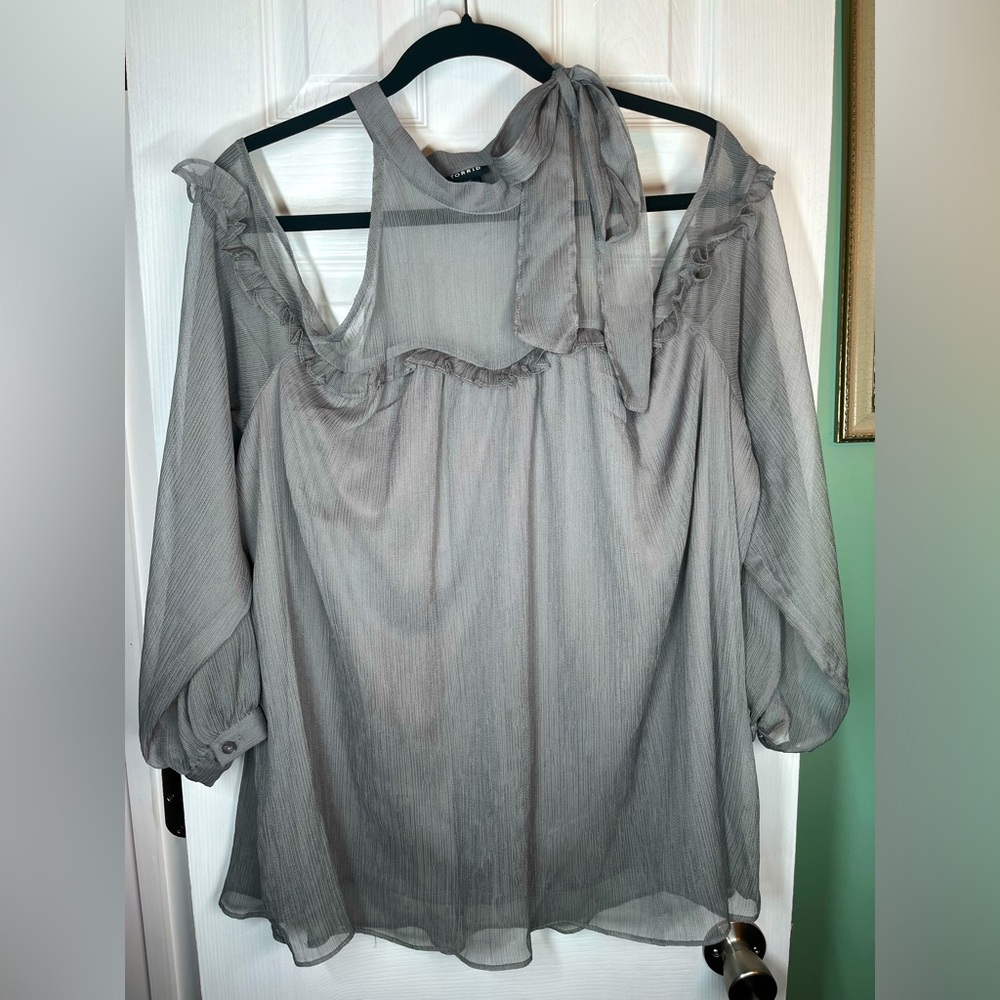Like new torrid cold shoulder silver sheer top with lining size 1X